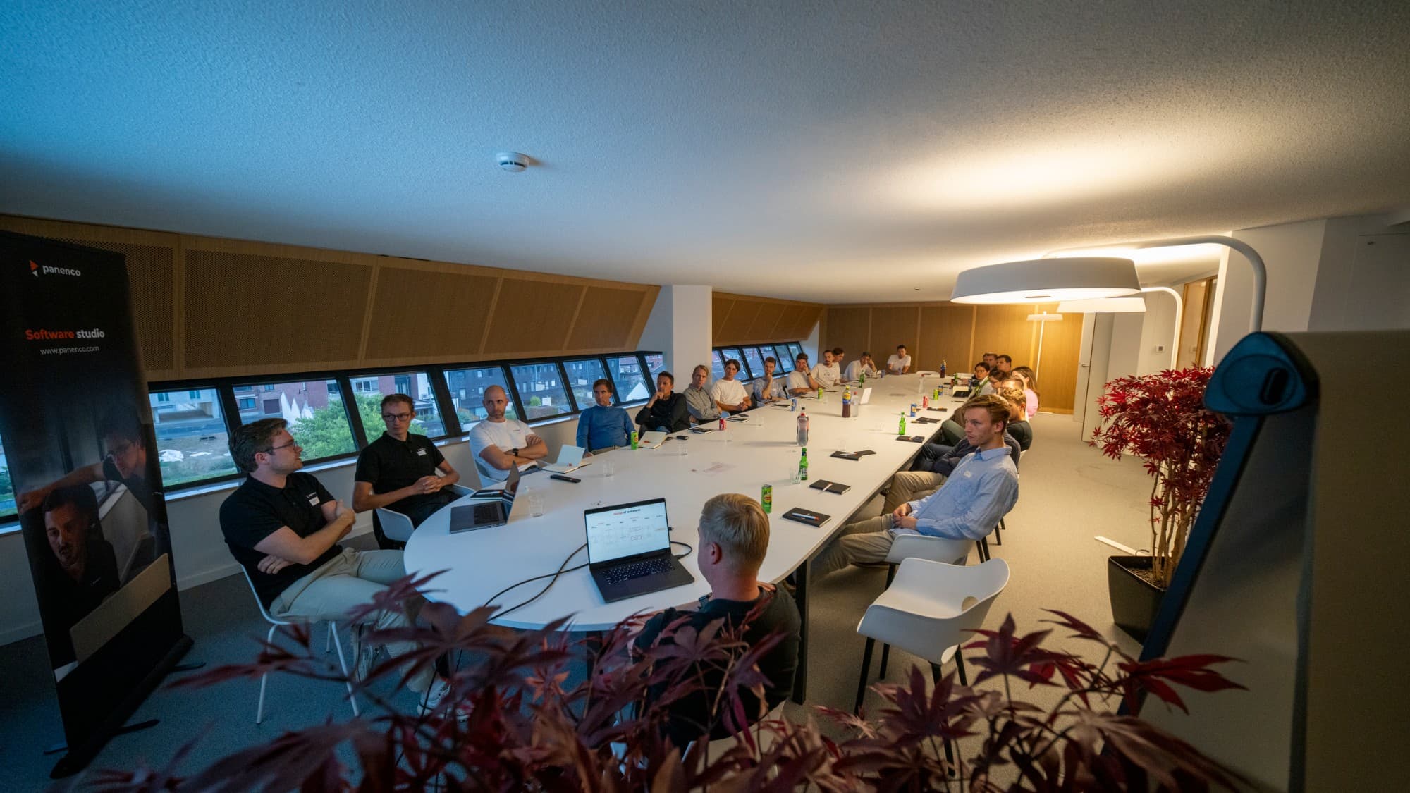 Attendees seated around the roundtable during the AI deployment evening session.